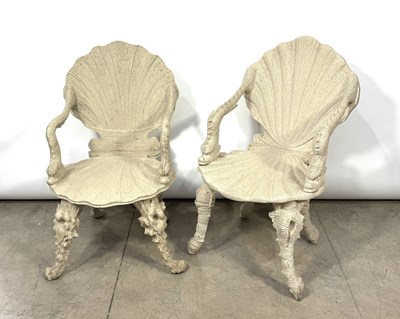 Lot 731 - A pair of stone coloured grotto chairs, formed...