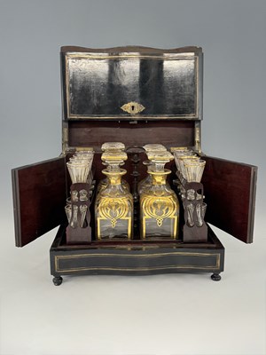 Lot 177 - A 19th century brass strung liqueur set,...