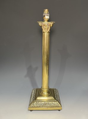 Lot 638 - A Victorian brass Corinthian column table lamp,...