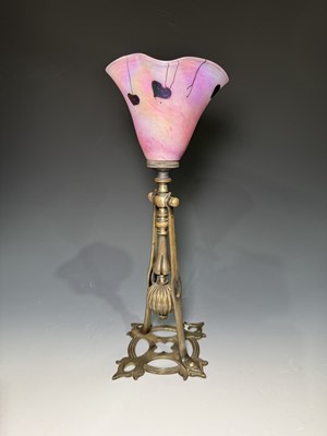 Lot 639 - A silvered brass gimbal table lamp, neo-gothic...