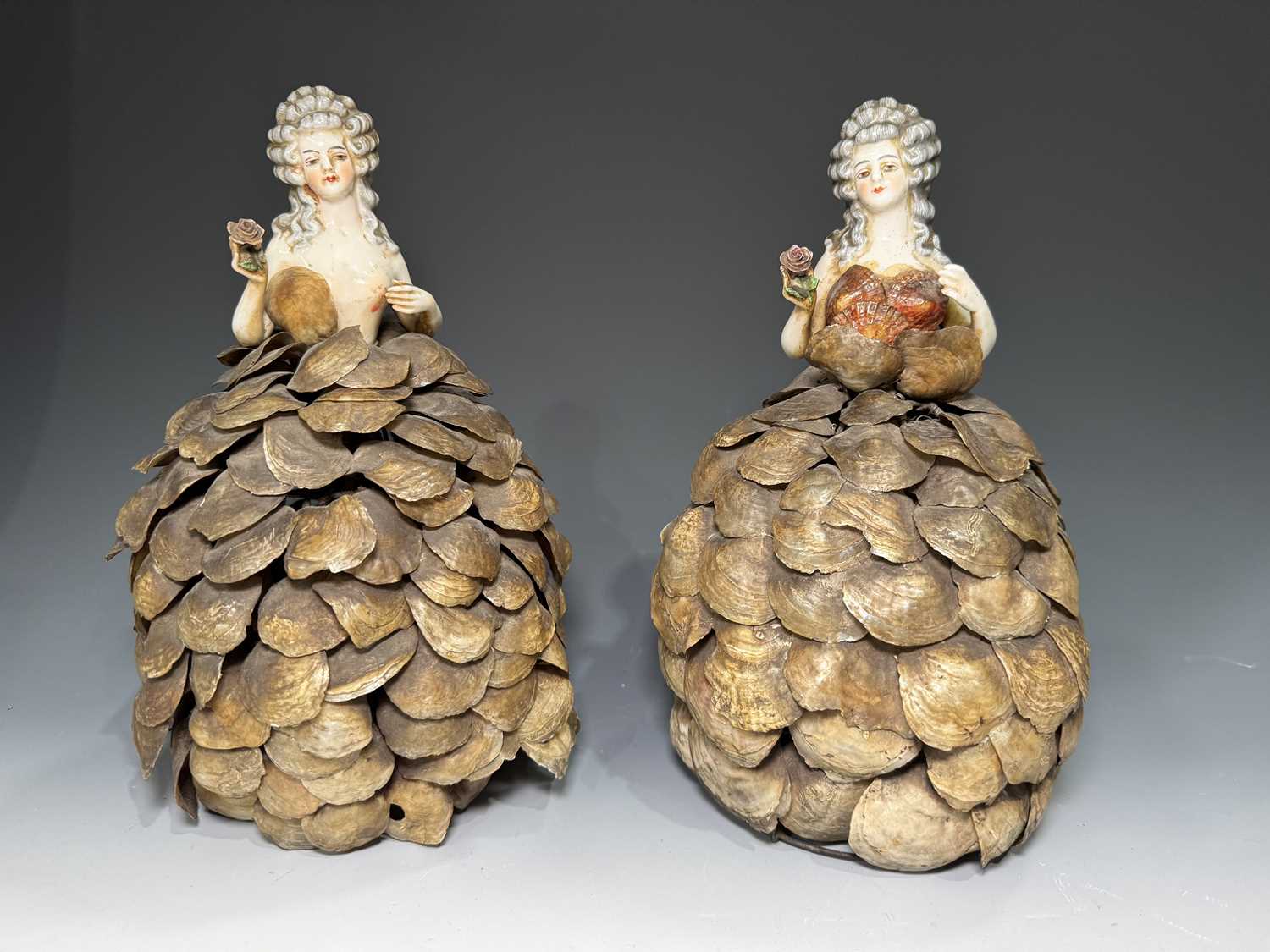Lot 646 - A pair of figural table lamp shades, in the...