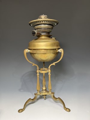 Lot 615 - A Messenger brass oil lamp, marked to wick...