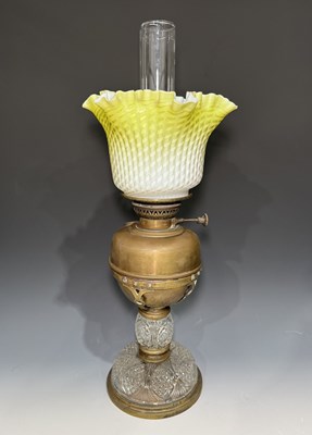 Lot 633 - A Victorian brass oil lamp, yellow fading to...