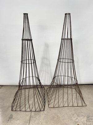 Lot 799 - A pair of vintage wire work fish trap-type...