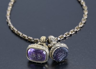 Lot 30 - A 9ct gold chain, suspending two intaglio seal fobs