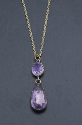 Lot 7 - A 19th century yellow metal purple paste drop pendant, with 9ct gold chain