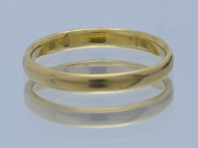 Lot 50 - A 22ct gold wedding band ring