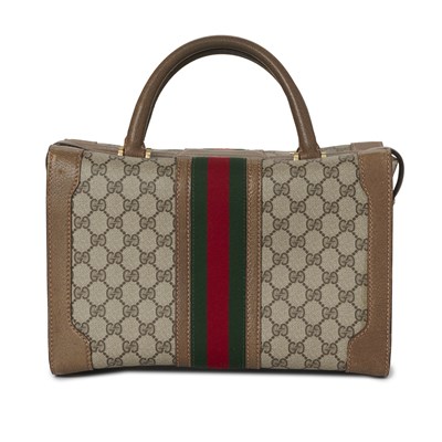 Lot 389 - Gucci, a vintage Supreme Web travel case.
