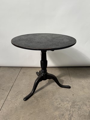 Lot 741 - A 19th century black lacquered tripod tilt top...