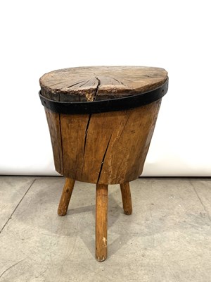 Lot 732 - A butchers block, possibly French, raised on...
