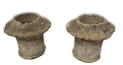 Lot 789 - A pair of cast stone garden planters, formed...