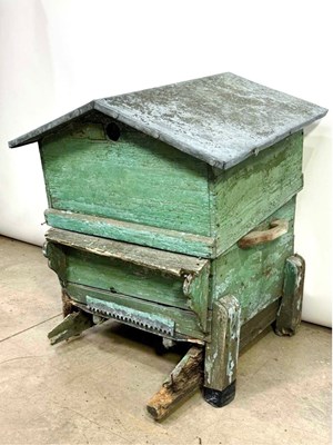 Lot 735 - A decorative absinthe-green painted beehive...