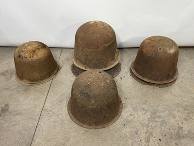Lot 796 - Six cast iron cauldrons or planters, bell from,...