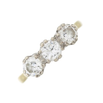 Lot 79 - An 18ct gold diamond three-stone ring