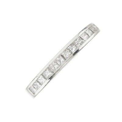 Lot 215 - A platinum diamond half eternity ring