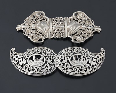 Lot 426 - Two Victorian cast silver buckles, one by...