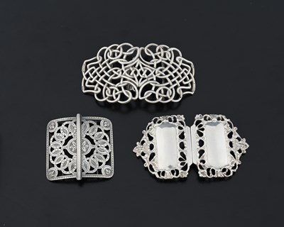 Lot 427 - Three silver buckles, one by William Hutton...
