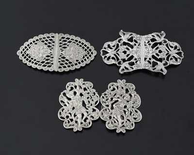 Lot 429 - Three silver buckles, one cast example by...
