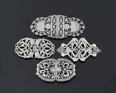 Lot 430 - Four silver buckles, one cast example by...