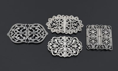 Lot 432 - Four silver buckles, one by The Alexander...