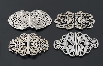 Lot 435 - Four silver buckles, one cast example by...