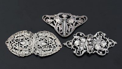 Lot 440 - Three silver buckles, one cast example by...