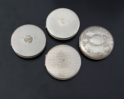 Lot 146 - Four Elizabeth II silver compacts, three...