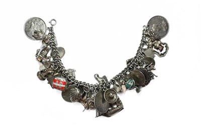 Lot 487 - A silver charm bracelet