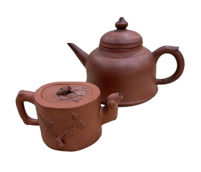 Lot 213 - Two Chinese Yixing terracotta teapots