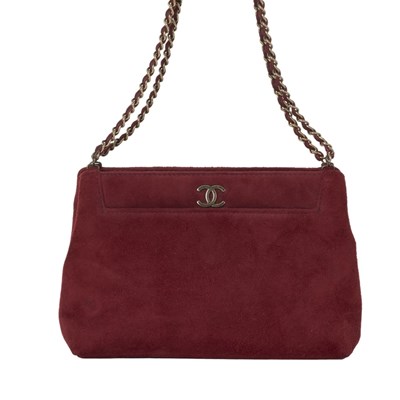 Lot 343 - Chanel, a small suede handbag.