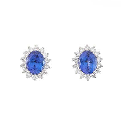 Lot 47 - A pair of 18ct gold tanzanite and diamond cluster earrings