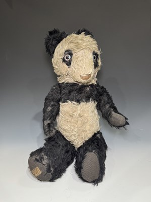 Lot 270 - A Merrythought mohair Panda bear, c.1940,...