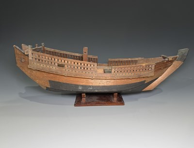 Lot 218 - A scratch-built boat on stand, 41cm long