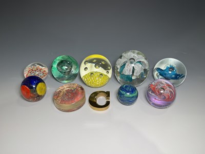 Lot 205 - A collection of coloured glass paperweights...