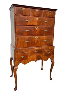 Lot 769 - A George I feather-banded walnut chest on...