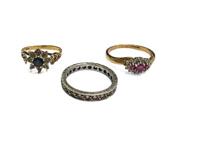 Lot 403 - Two 9ct gold gem-set rings and a white metal full eternity ring