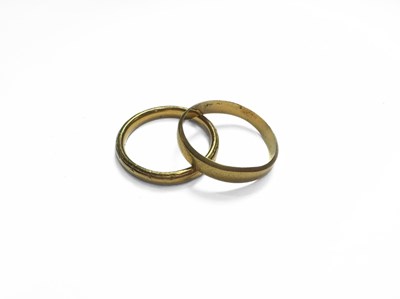 Lot 410 - Two 22ct gold wedding band rings