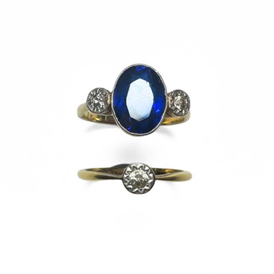 Lot 396 - Two 18ct gold blue gem and diamond rings