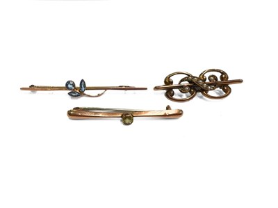 Lot 484 - Three early 20th century 9ct gold gem-set brooches