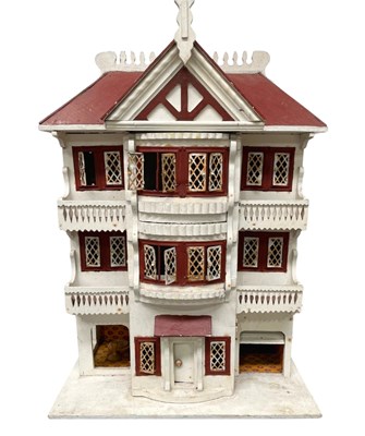 Lot 508 - A 20th century three storey plywood red, brown...