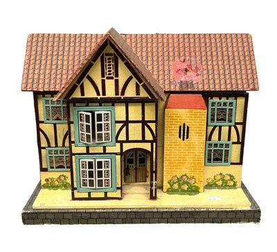 Lot 506 - A mid century wooden Mock Tudor style house,...