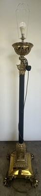 Lot 748 - A telescopic brass standard lamp, possibly...