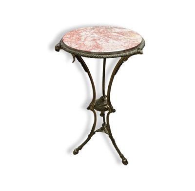 Lot 718 - A french style gilt metal tripod side or wine...