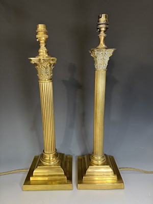 Lot 618 - A near pair of late 19th century brass...