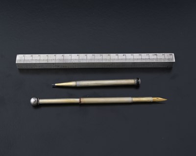Lot 349 - A George V silver novelty combination rule,...