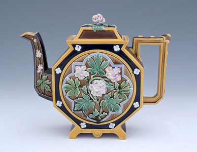 Lot 549 - An Aesthetic Movement majolica teapot, Brown...