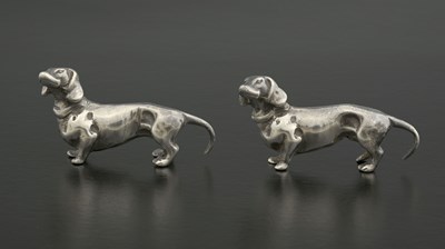 Lot 188 - A pair of Elizabeth II silver cast hounds,...