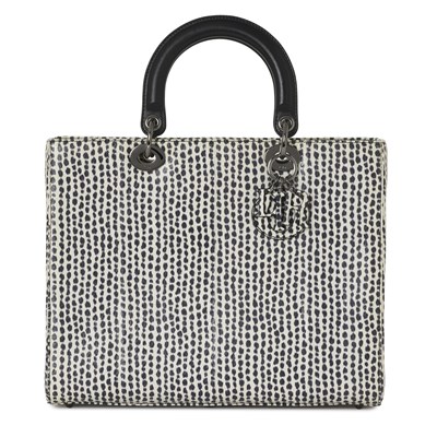 Lot 357 - Christian Dior, a spotted python Lady Dior GM handbag.