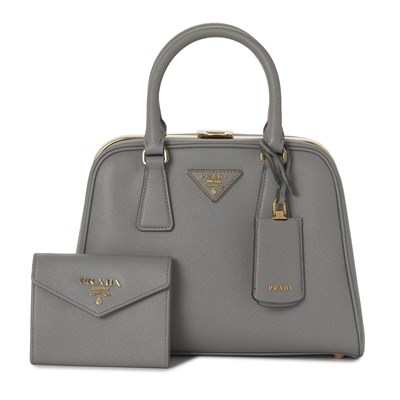 Lot 504 - Prada, a Pyramid Frame handbag w/ purse.