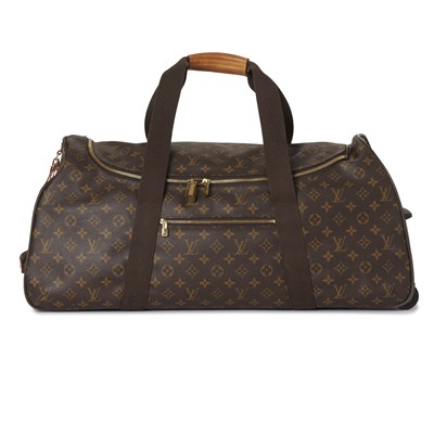 Lot 465 - Louis Vuitton, a monogram Eole 65 rolling luggage bag.